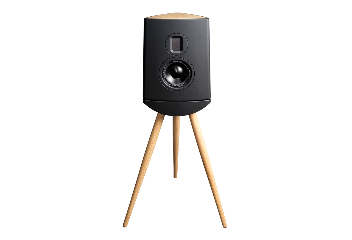 Black speaker with wooden legs on a white background