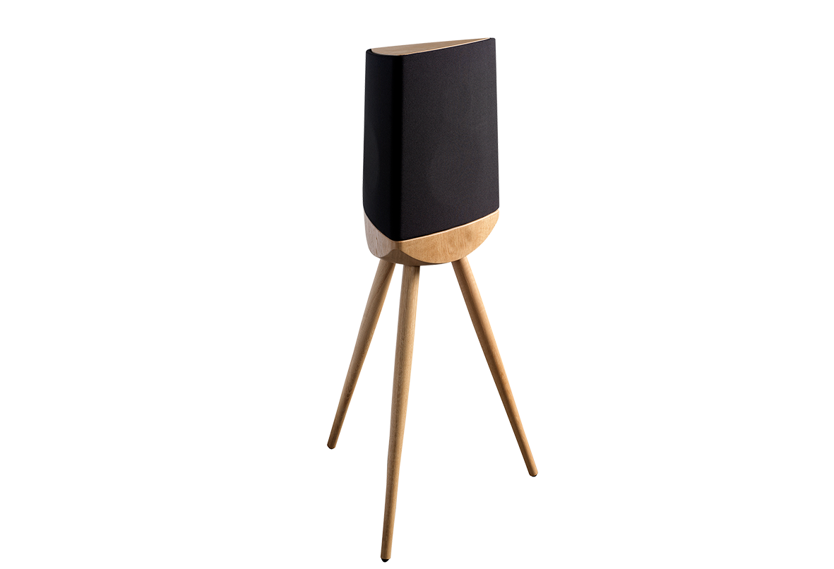 Black speaker on wooden tripod stand against a white background